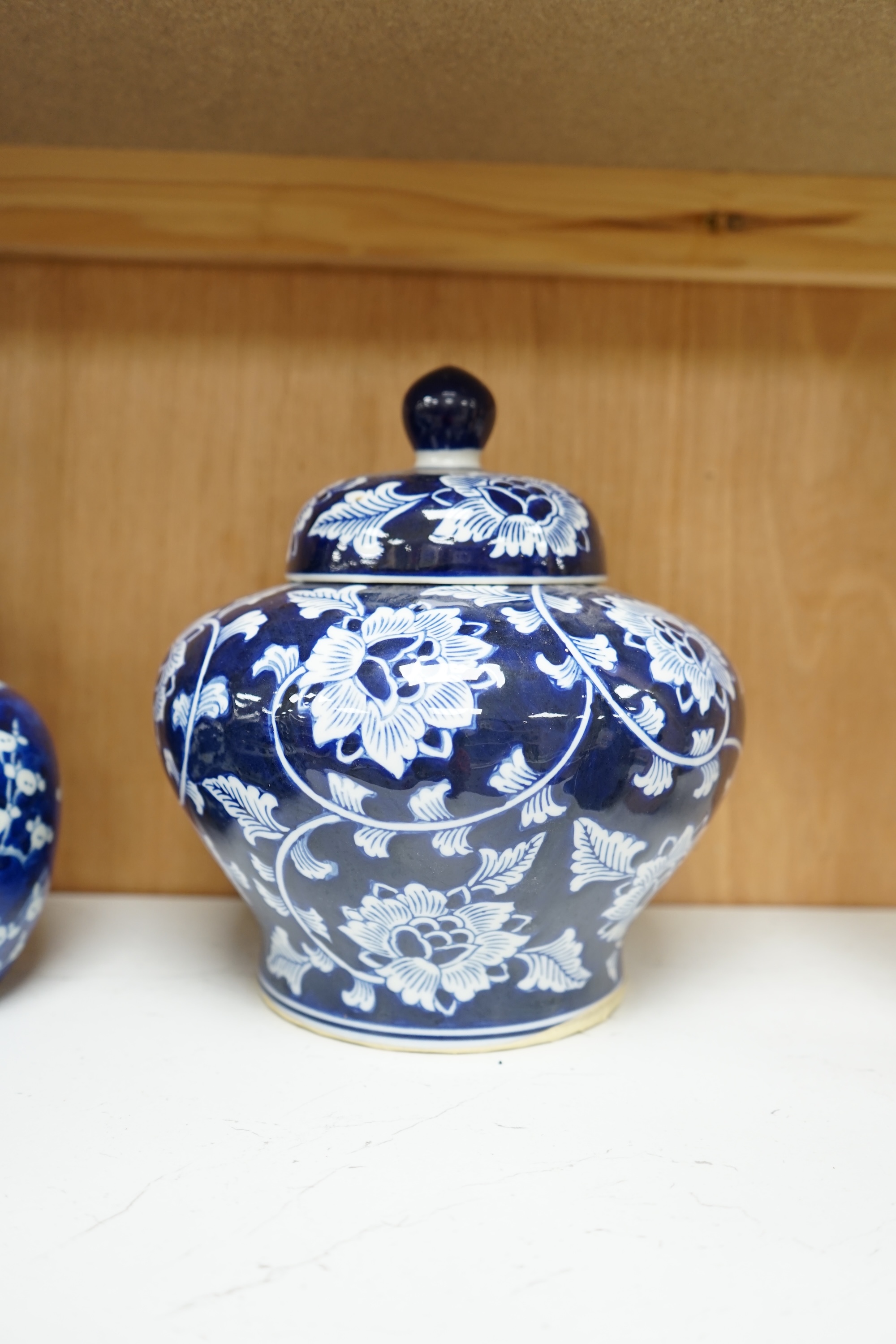 Six various Chinese prunus pattern blue and white jars, tallest 26cm. Condition - varies